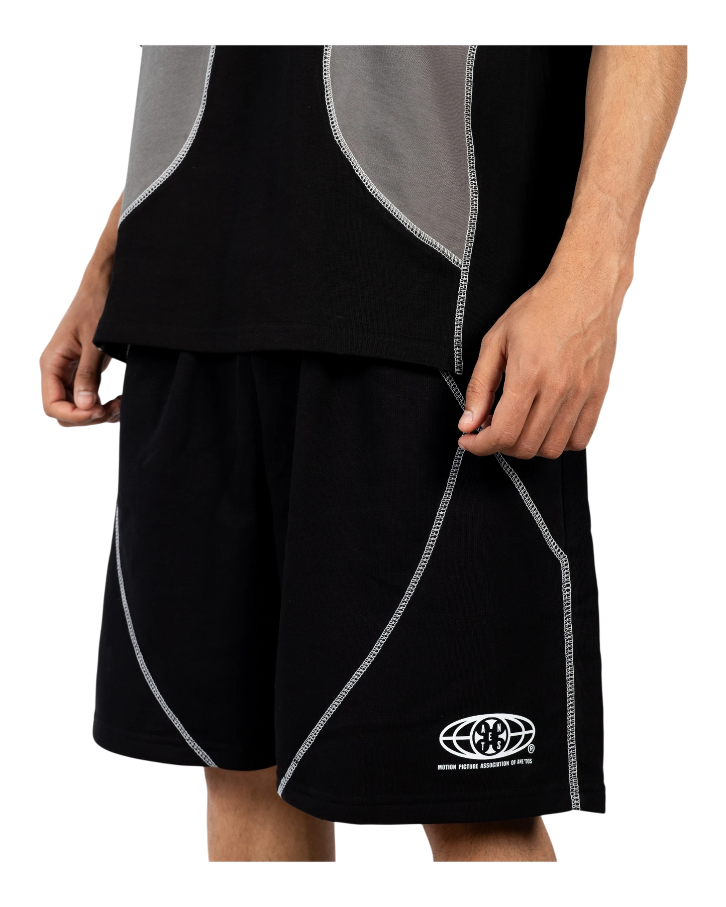 Anetos black cotton shorts with contrasting grey panels and white stitching. Features a subtle logo on the hem.