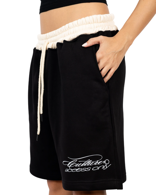 Anetos black cotton blend shorts with cream drawstring waist and embroidered logo on the hem.