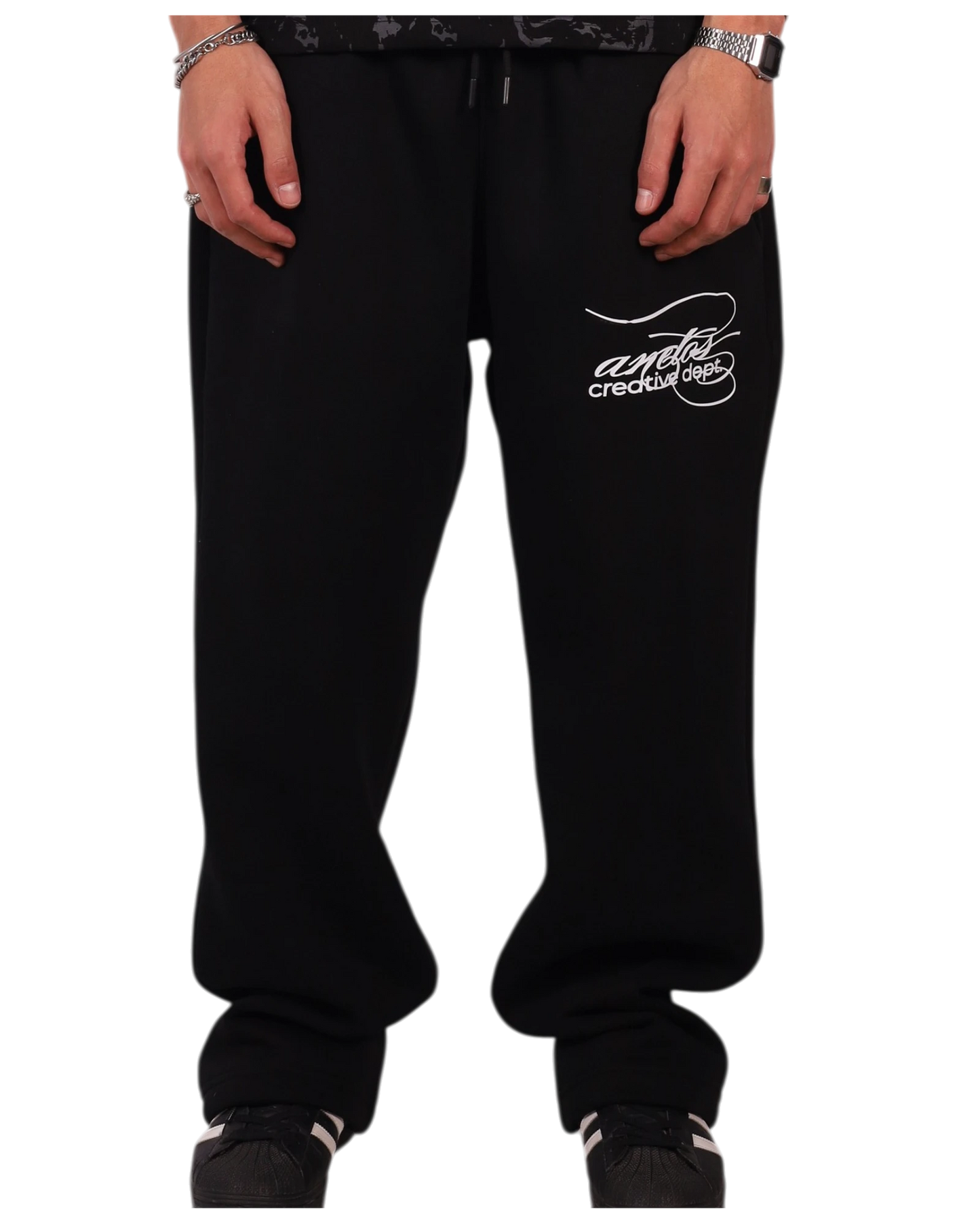 Anetos black cotton sweatpants with white embroidered logo on the left thigh. Relaxed fit, drawstring waist, and cuffed ankles.