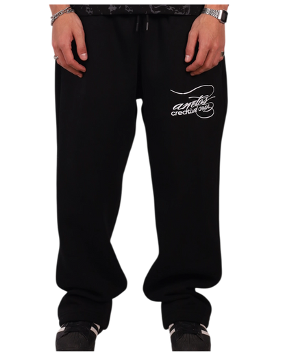 Anetos black cotton sweatpants with white embroidered logo on the left thigh. Relaxed fit, drawstring waist, and cuffed ankles.