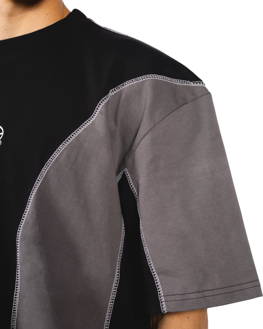 Anetos black and grey colorblock t-shirt with contrast stitching and short sleeves.