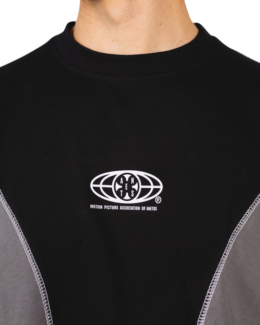 Anetos black and grey long-sleeve shirt with white contrast stitching and a white graphic logo on the chest.