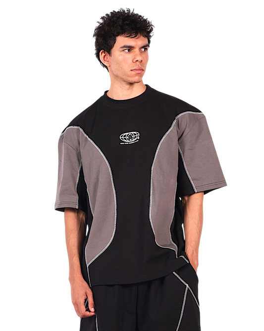 Anetos black and grey color-block t-shirt with white contrast stitching and a crew neck.
