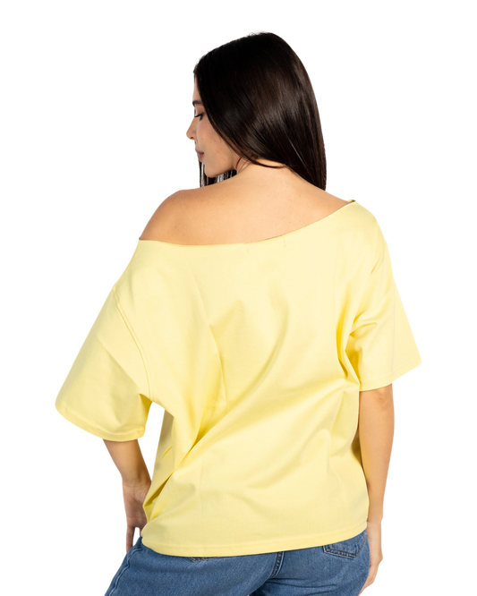 Anetos butter yellow off-shoulder top with short sleeves, made of soft fabric.