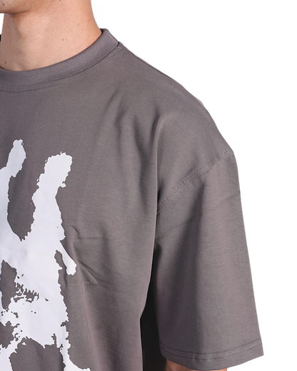 Anetos grey cotton t-shirt with white "From Cairo To The World" graphic print on the front, worn by a man.