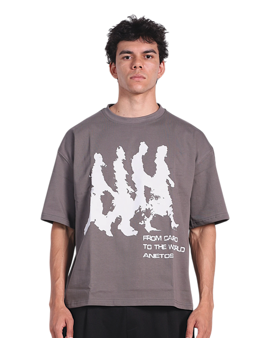 Anetos grey cotton t-shirt with white graphic print of walking figures and text "FROM CAIRO TO THE WORLD ANETOS".
