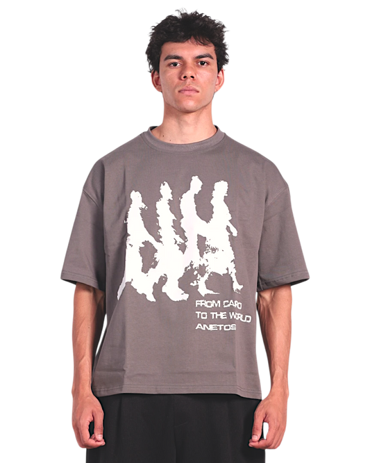 Anetos grey cotton t-shirt with white graphic print of walking figures and text "FROM CAIRO TO THE WORLD".