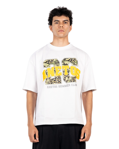 Anetos white cotton t-shirt with camouflage and leopard print graphic and yellow text.