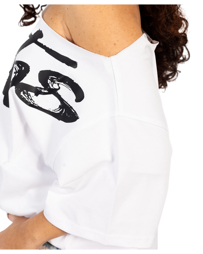 Anetos white 100% Egyptian cotton off-shoulder dress with oversized fit and black graphic print.