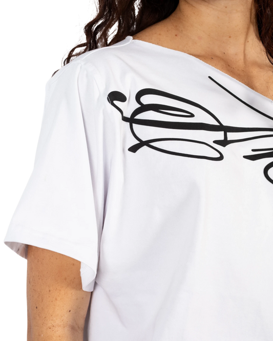 Anetos white off-shoulder t-shirt with black graphic print. Short sleeves, comfortable cotton blend.