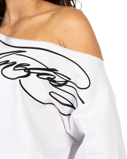 Anetos white off-shoulder top with black abstract graphic print. Cotton blend fabric.