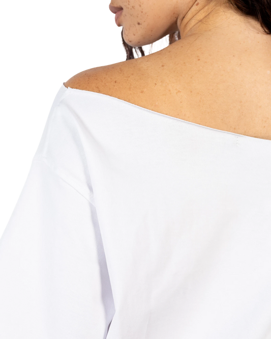 Anetos white off-shoulder puff sleeve top made of cotton, perfect for casual or dressy occasions.