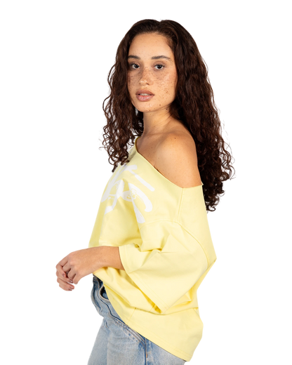 Anetos yellow 100% Egyptian cotton off-shoulder top with oversized fit and white graphic print.