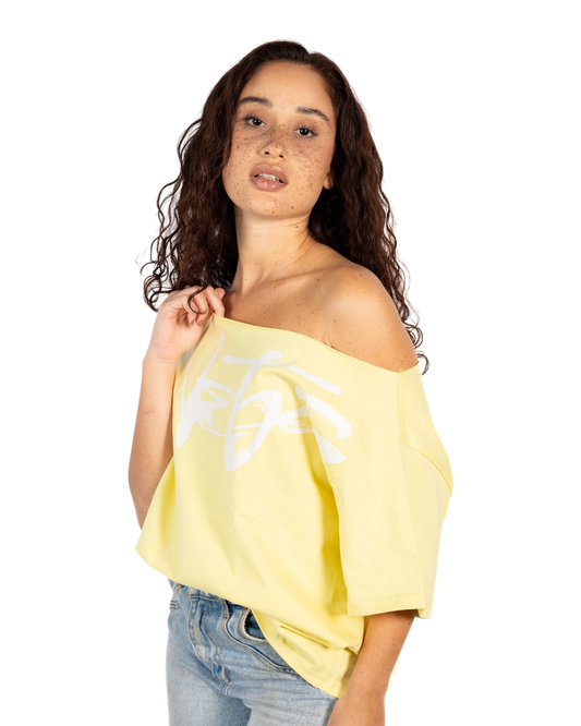 Anetos yellow 100% Egyptian cotton off-shoulder top with oversized fit and white signature graphic.