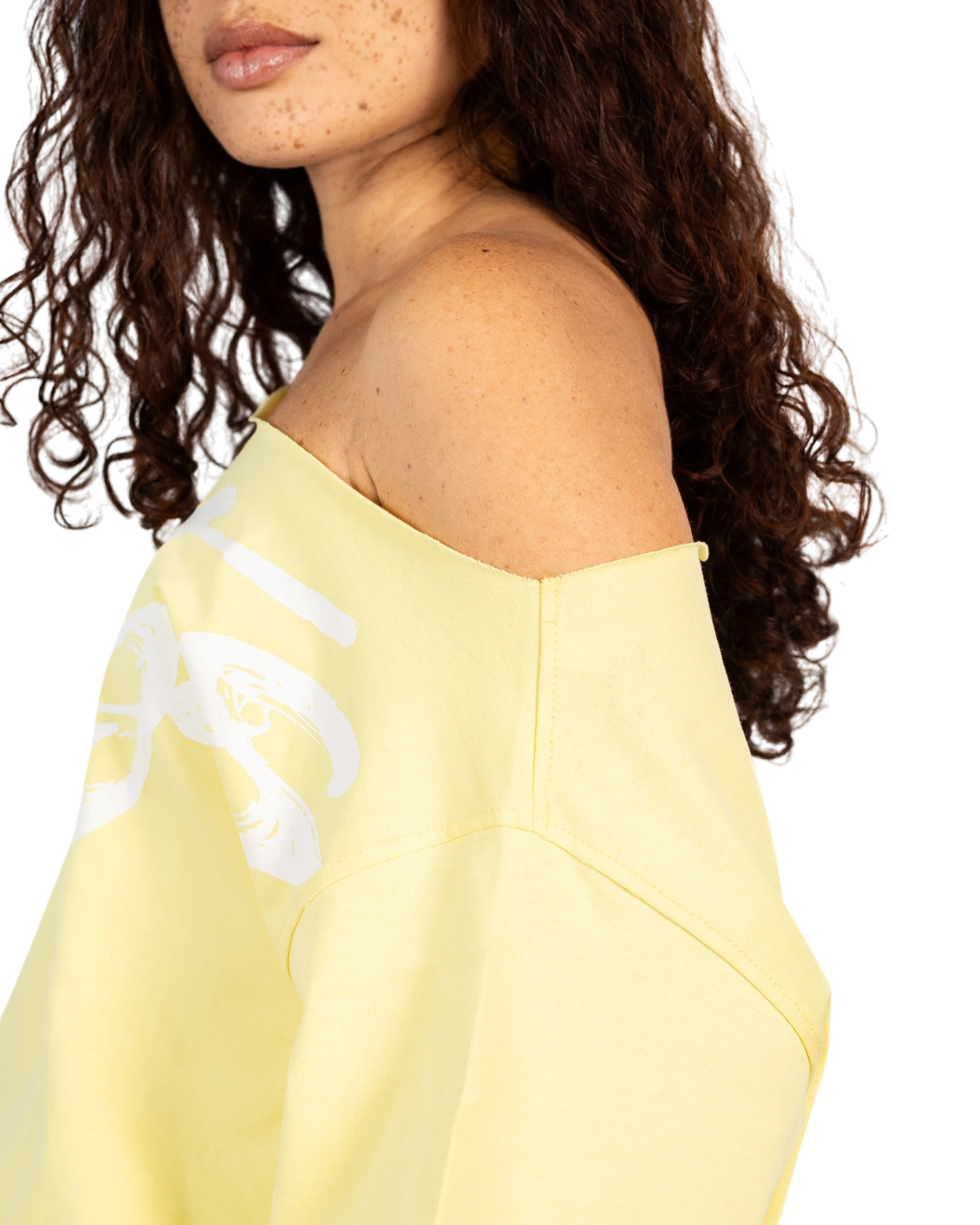 Anetos yellow 100% Egyptian cotton off-shoulder top with oversized fit and white signature graphic.